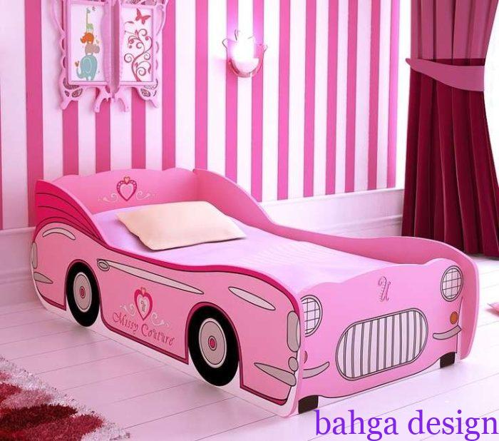 غرفة نوم اطفال علي شكل سيارة باللون الروز