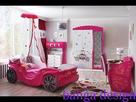 غرفة نوم اطفال مودرن باللون الفوشيا السرير علي شكل سيارة